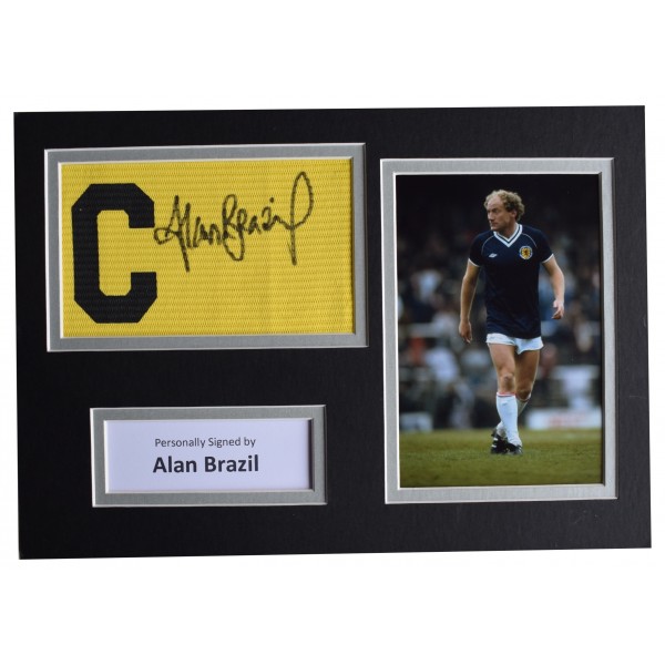 Alan Brazil Signed Captains Armband A4 photo display Scotland Football AFTAL COA Perfect Gift Memorabilia		