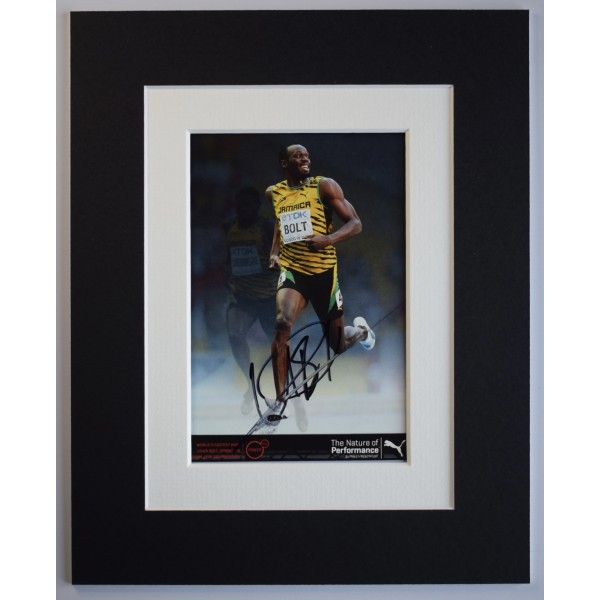Usain Bolt Signed Autograph 10x8 photo display Athletics Olympics SMUDGED COA AFTAL Perfect Gift Memorabilia	