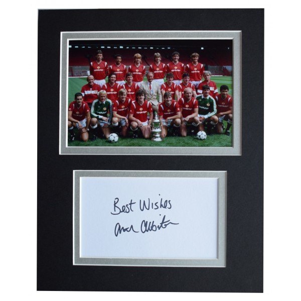Arthur Albiston Signed Autograph 10x8 photo display Manchester Utd AFTAL COA Perfect Gift Memorabilia	
