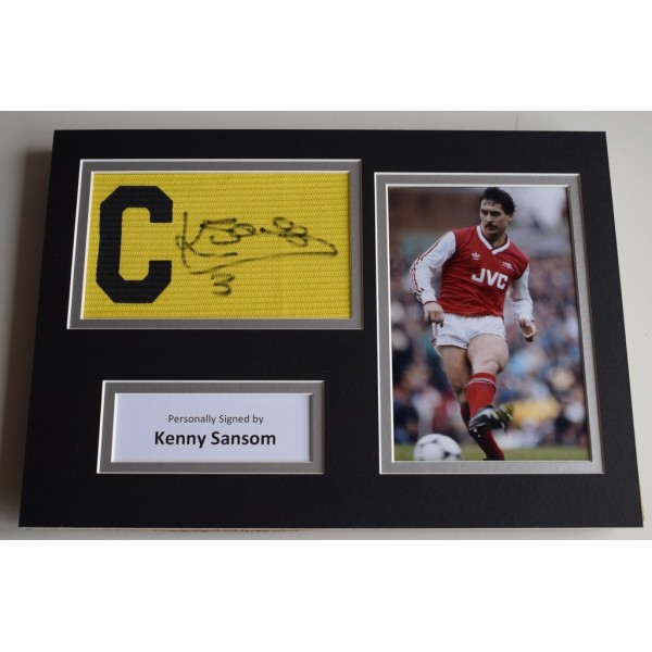 Kenny Sansom SIGNED Captains Armband A4 Photo Display Arsenal    AFTAL & COA Memorabilia PERFECT GIFT